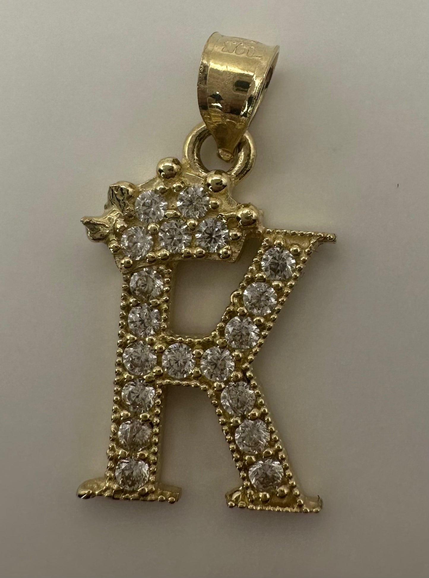 Small initial pendant letter "K"